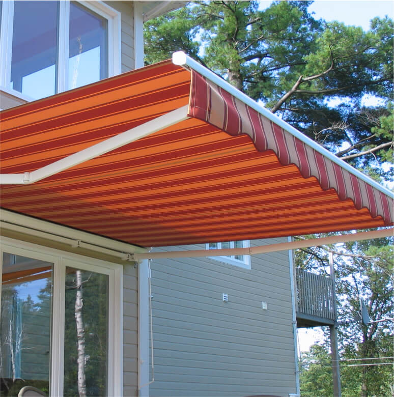 Motorized retractable Awnings in White and Red by Better Exteriors